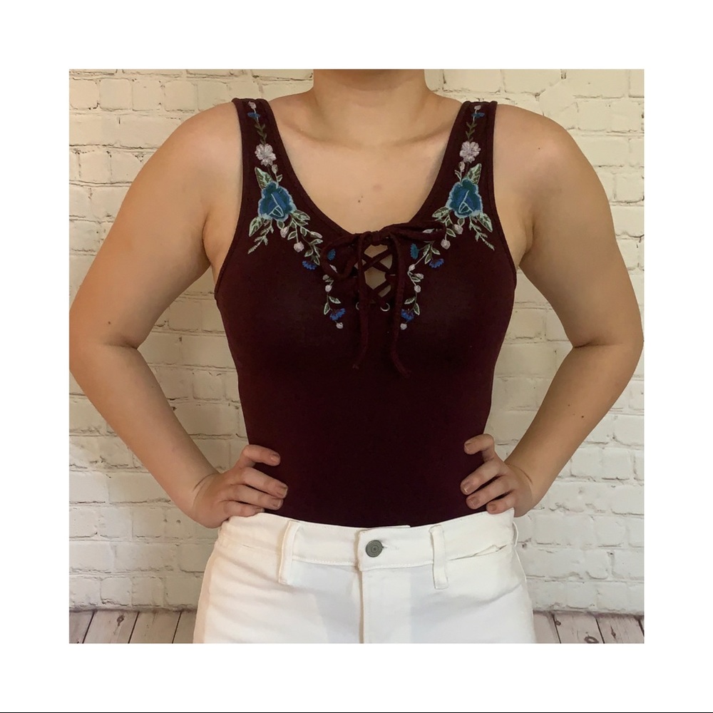 American Eagle burgundy bodysuit with floral embroidery